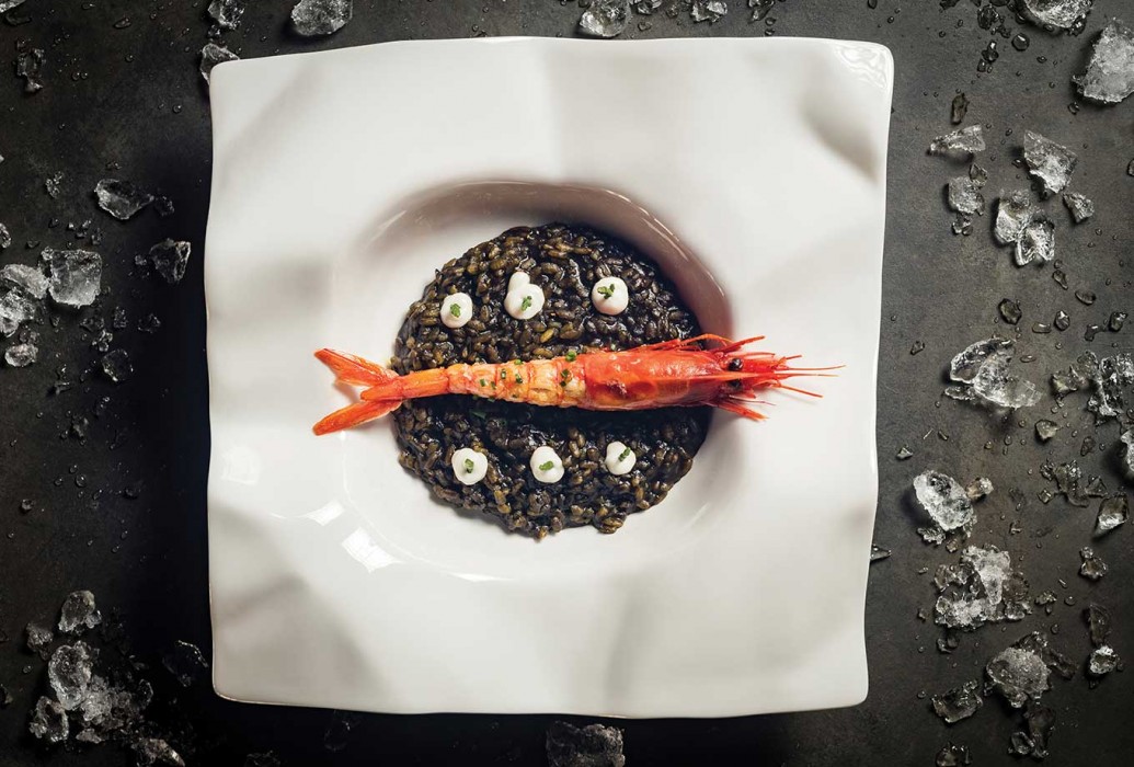 squid ink rice with carabinero. La Gran Tortuga Restaurant, Mallorca squid ink rice with carabinero. La Gran Tortuga Restaurant, Mallorca