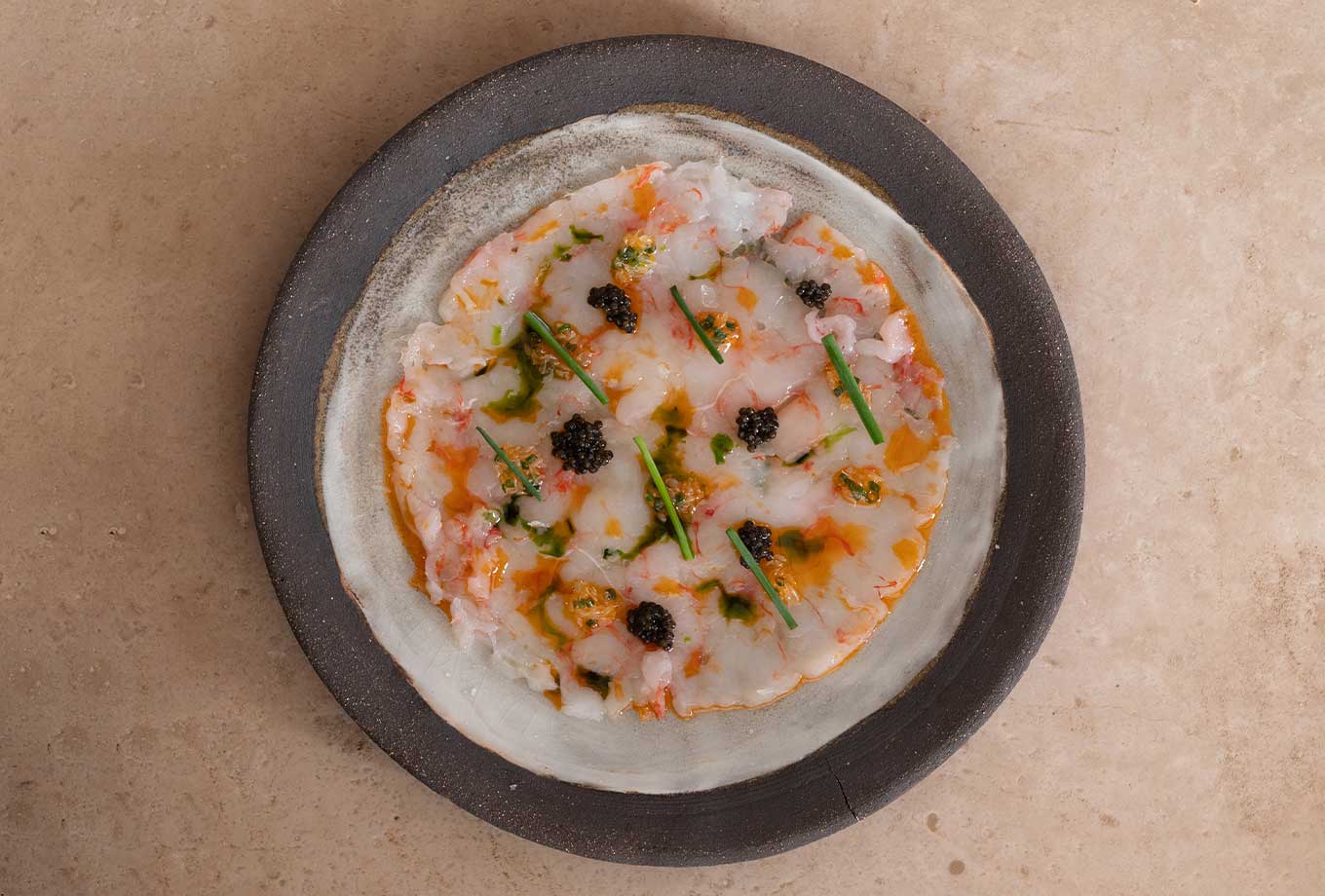 Ibizan prawn carpaccio with caviar. Madunia Ibiza Restaurant Ibizan prawn carpaccio with caviar. Madunia Ibiza Restaurant
