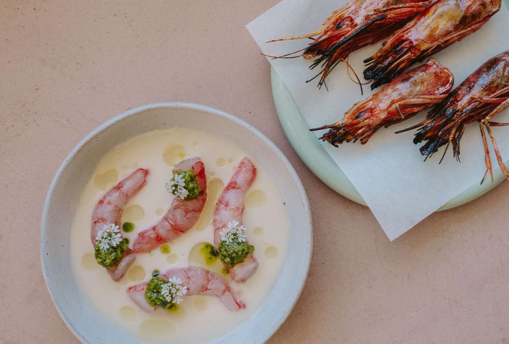 Raw shirmp tails, almond milk and its head BBQ. Restaurante Nudo, Ibiza Raw shirmp tails, almond milk and its head BBQ. Restaurante Nudo, Ibiza