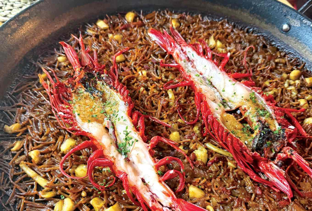 Lobster with fried egg and potatoes. Can Martí restaurant, Formentera Lobster with fried egg and potatoes. Can Martí restaurant, Formentera
