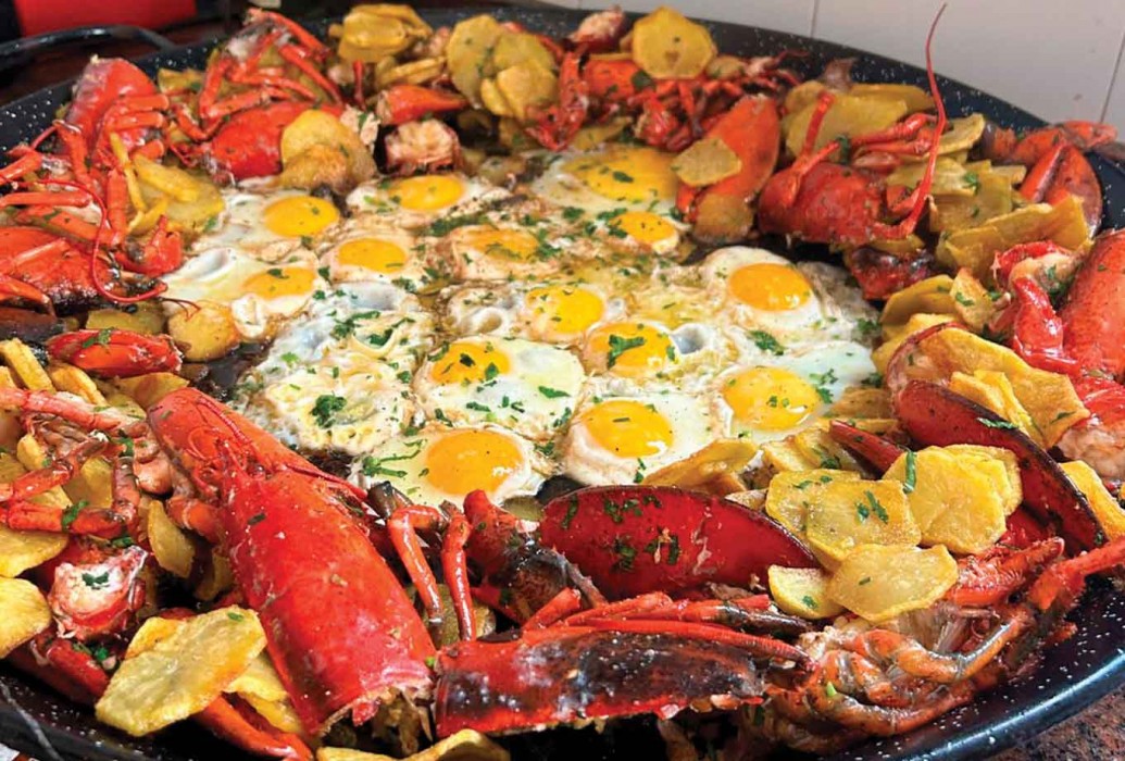 Lobster with fried egg and potatoes. Can Martí restaurant, Formentera Lobster with fried egg and potatoes. Can Martí restaurant, Formentera