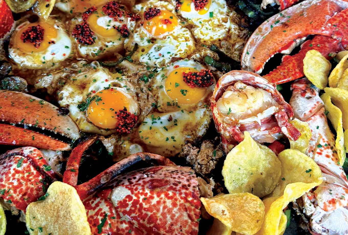 Lobster with fried egg and potatoes. Can Martí restaurant, Formentera Lobster with fried egg and potatoes. Can Martí restaurant, Formentera