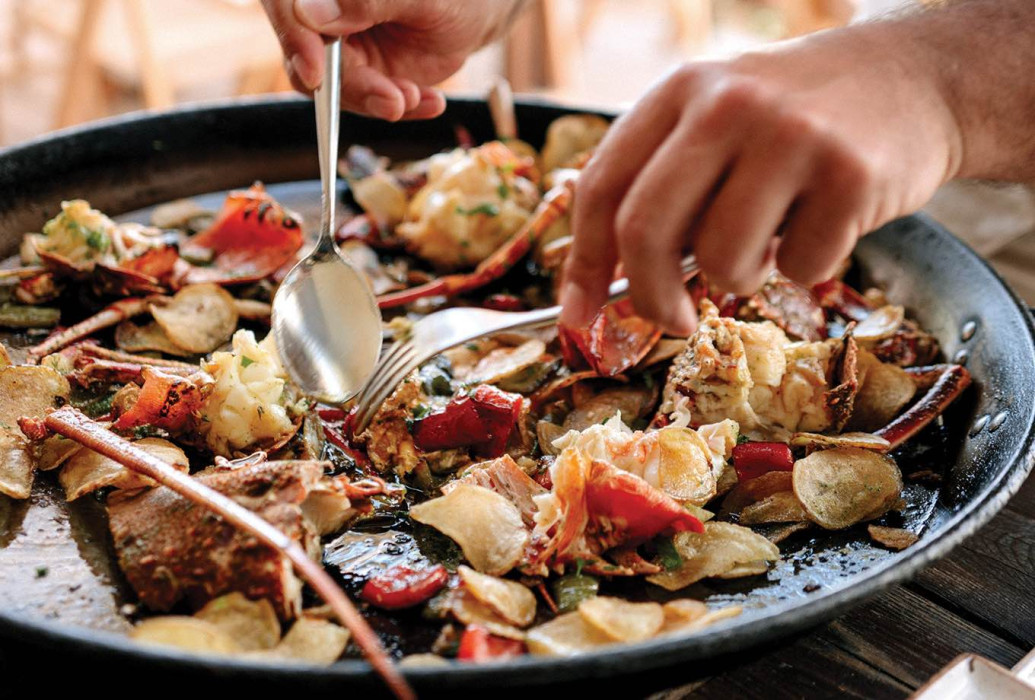 Lobster with fried egg and potatoes. Chezzgerdi dishes, Formentera Lobster with fried egg and potatoes. Chezzgerdi dishes, Formentera