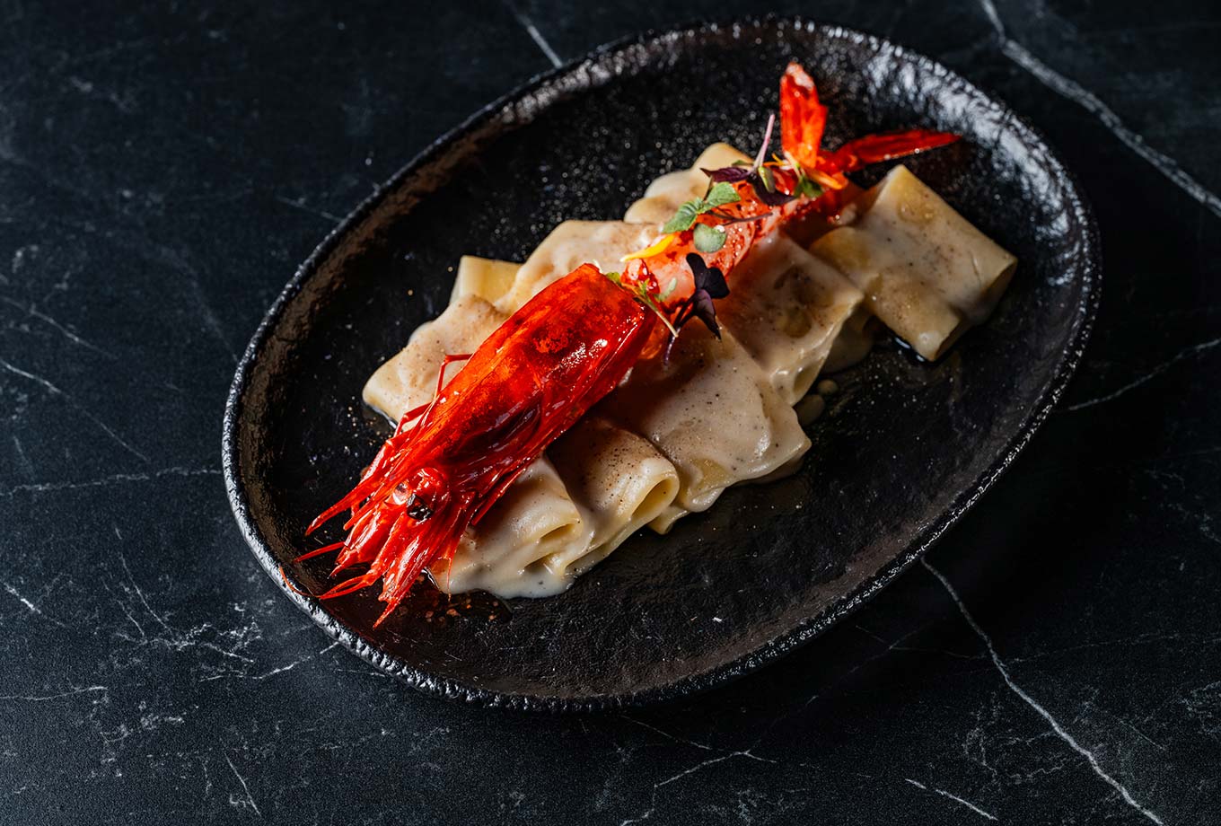 Paccheri pasta with caccio e pepe and scarlet prawn. Lío Mallorca